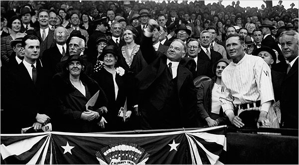 Herbert Hoover throwing out first pitch